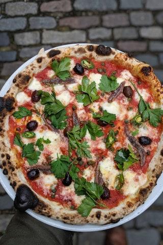 Walthamstow  Walthamstows premier pizzeria majors in longfermented sourdough bases craft beers and natural wine served...